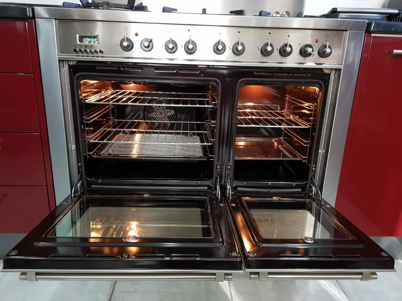 Double oven with both doors open and clean racks